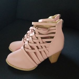 Pink booties. Never been worn size womens size 8.